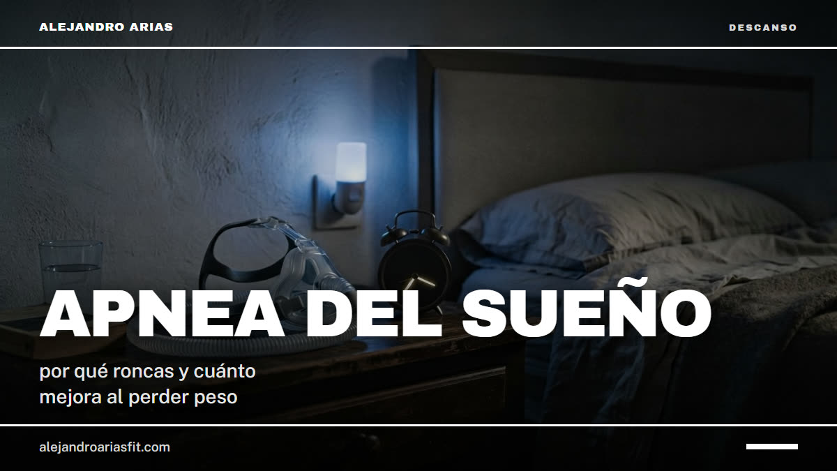 Apnea del sueño y sobrepeso: dormitorio a oscuras con la mascarilla CPAP y el despertador en la mesilla